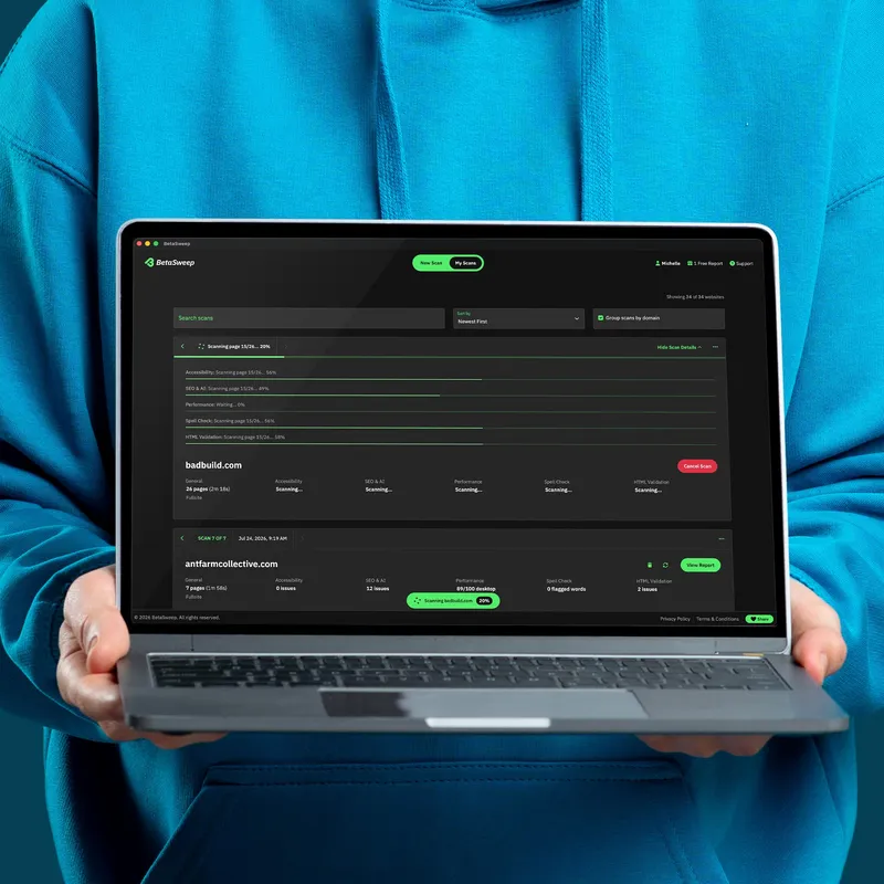 A young man holding a laptop showing the BetaSweep app running an active scan